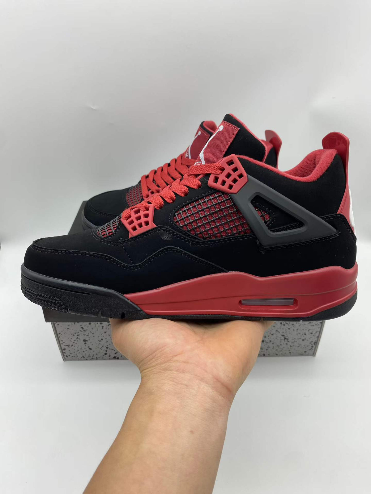 Air Jordan 4 Retro “Red Thunder”