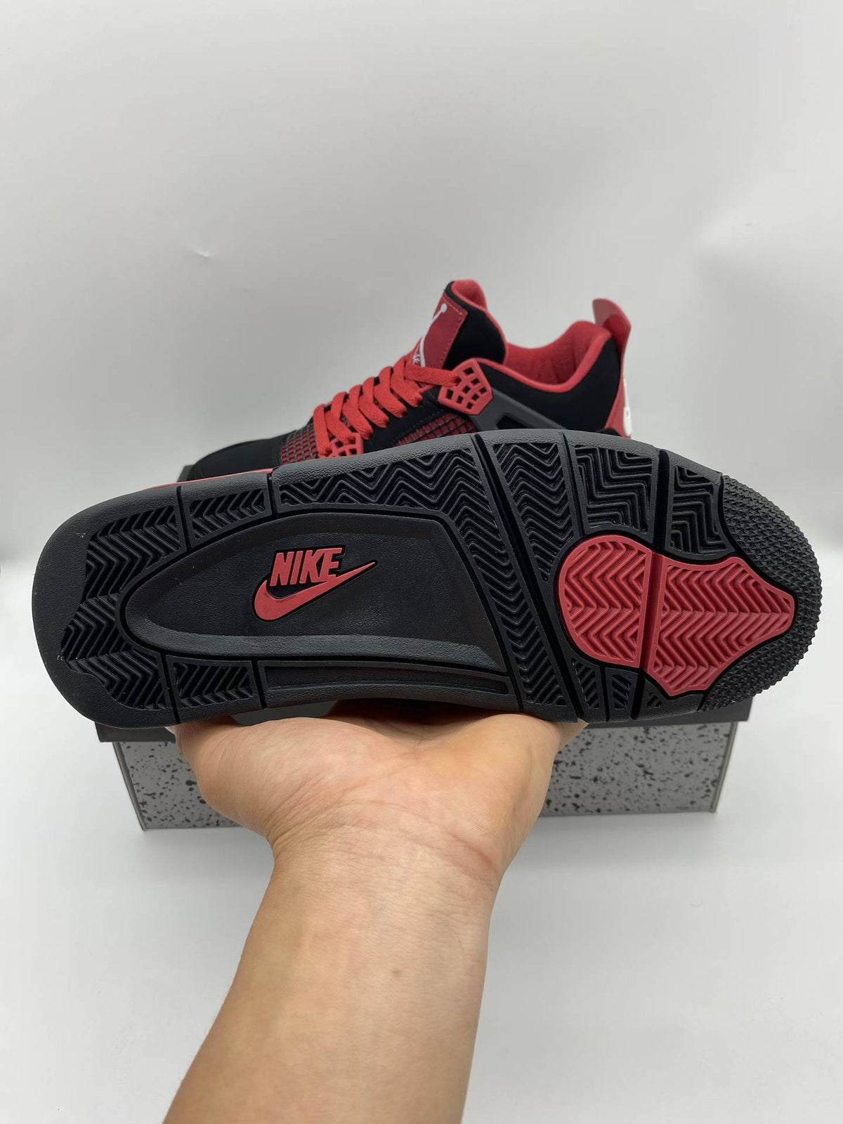Air Jordan 4 Retro “Red Thunder”